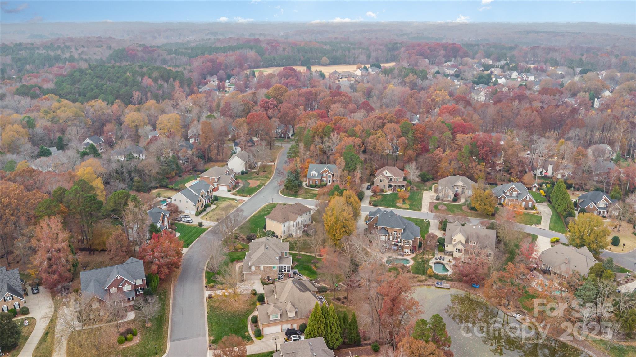 884 Clonmel Drive Matthews, NC 28104 - Photo 44 of 48 an aerial view of residential houses with outdoor space