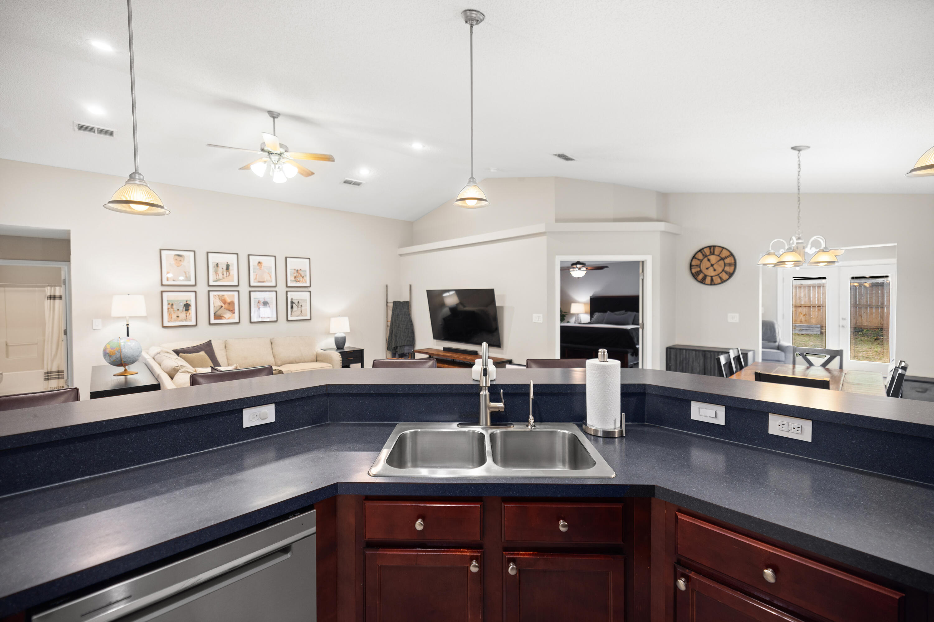 202 Limestone Circle Crestview, FL 32539 - Photo 14 of 49 a kitchen with a sink and living room view