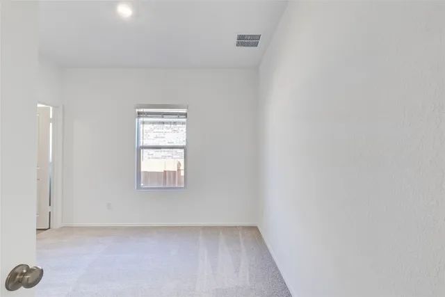 a white bath tub sitting next to a window