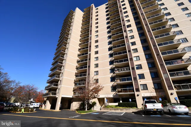 a front view of building with street