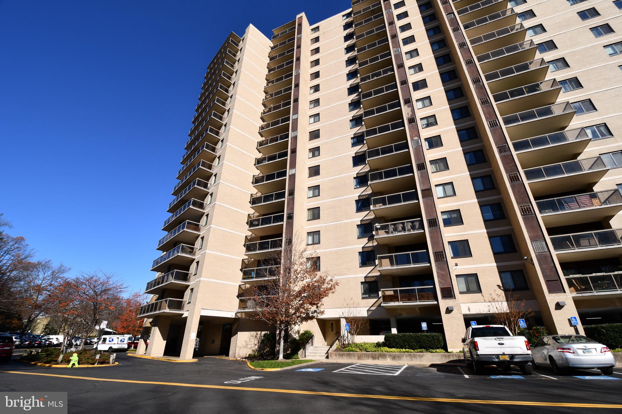 a front view of building with street