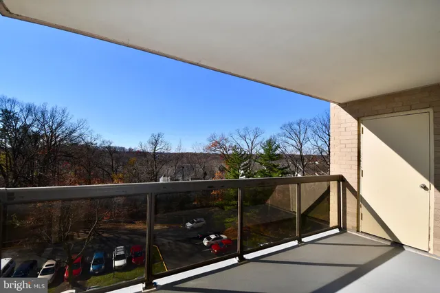 a view of balcony with furniture