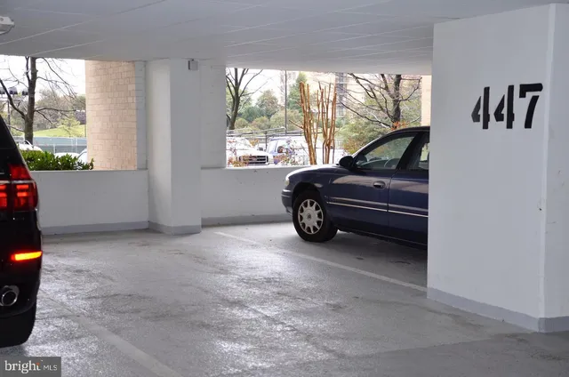 a view of swimming pool with outdoor seating and plants