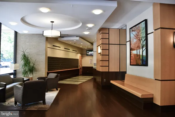 a view of a swimming pool in a backyard