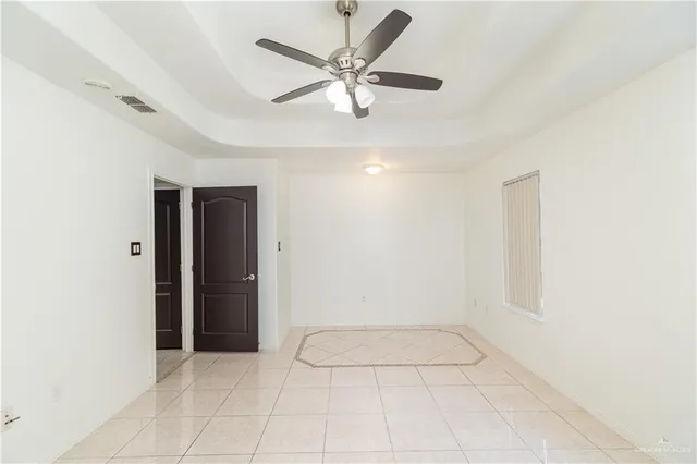 a spacious bathroom with a tub shower and sink