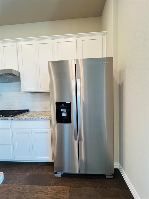 3305 Cross Shr Drive Anna, TX 75409 - Photo 16 of 31 Kitchen with tasteful backsplash, white cabinetry, stainless steel refrigerator with ice dispenser, and gas stovetop