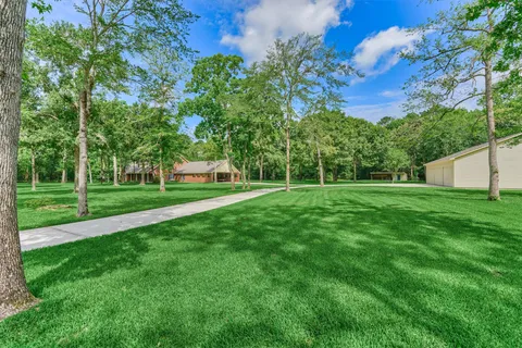 $1,050,000 | 11062 North Hidden Oaks, Conroe, TX 77384