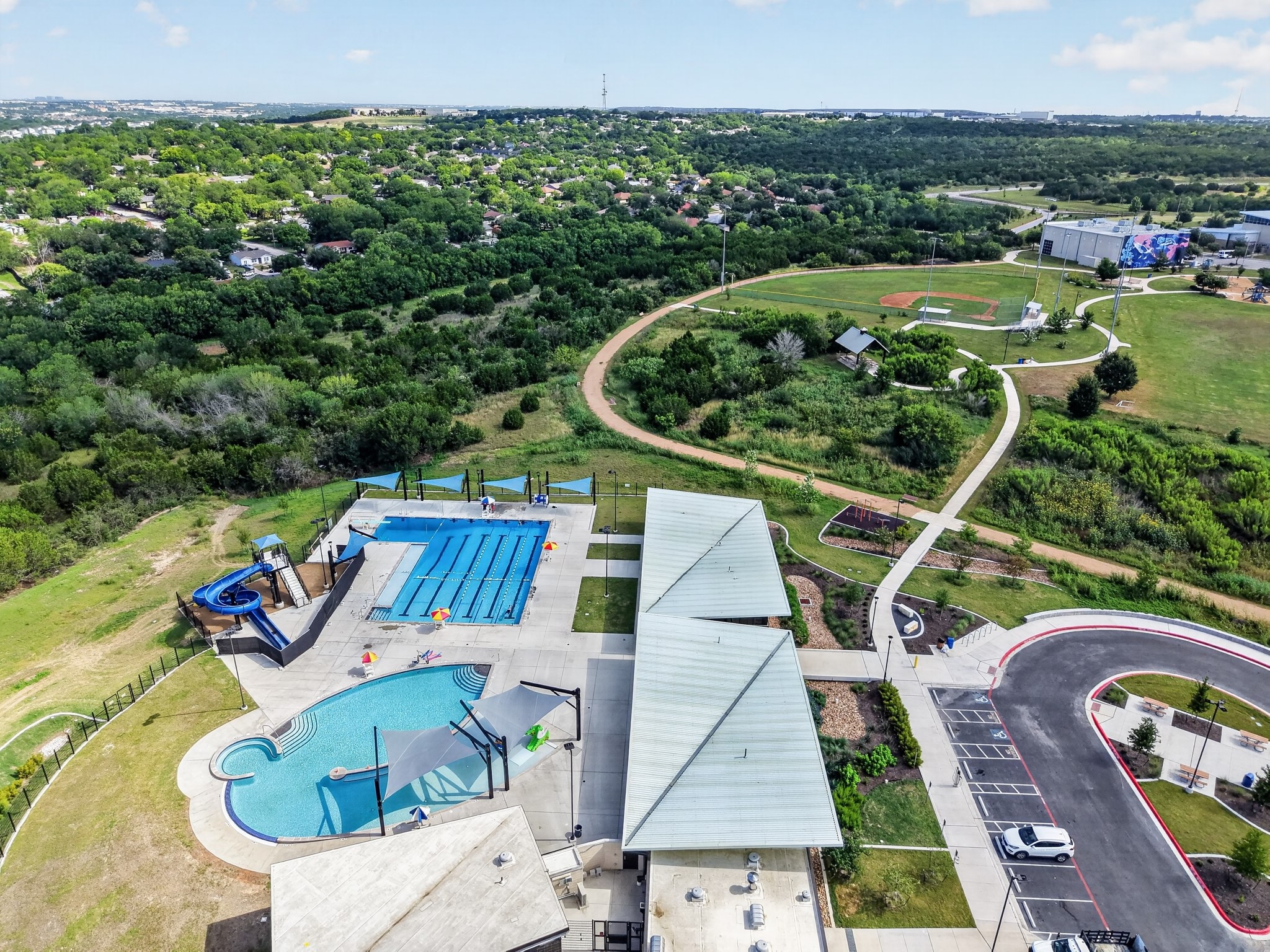5625 Signal Point Austin, TX 78724 - Photo 28 of 28 An aerial view showcases a vibrant community park with extensive recreational amenities.