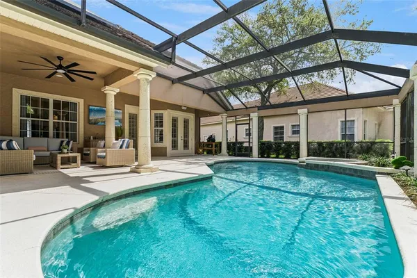 a bedroom with a bed and a desk