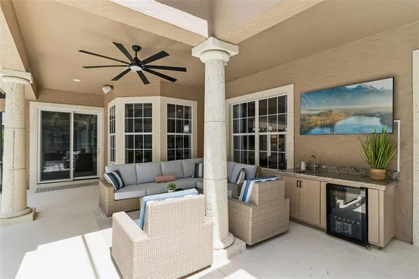 a bedroom with a bed and with furniture