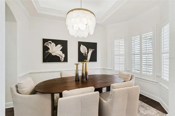 a bathroom with a toilet a sink and a window