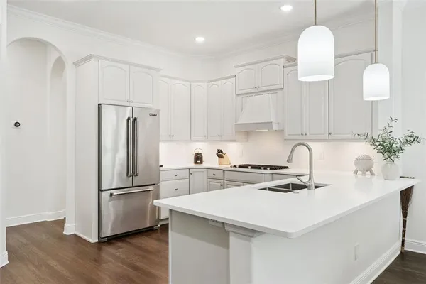 a view of a backyard with porch and a garden