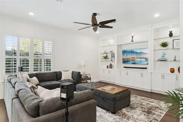 a view of house with yard and green space