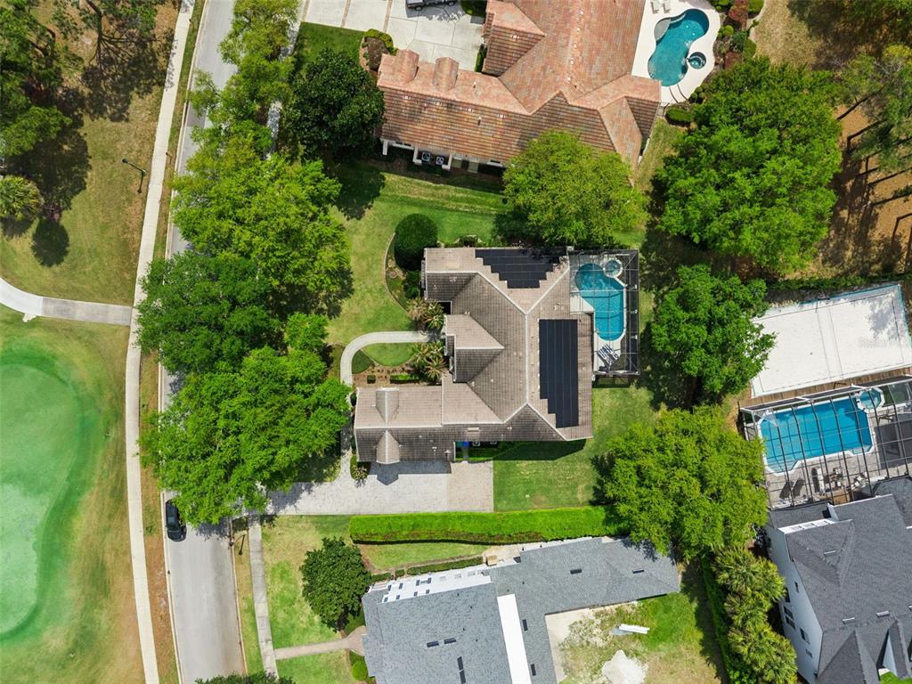 6110 Keenes Pointe Drive Windermere, FL 34786 - Photo 64 of 78 an aerial view of a house with a garden