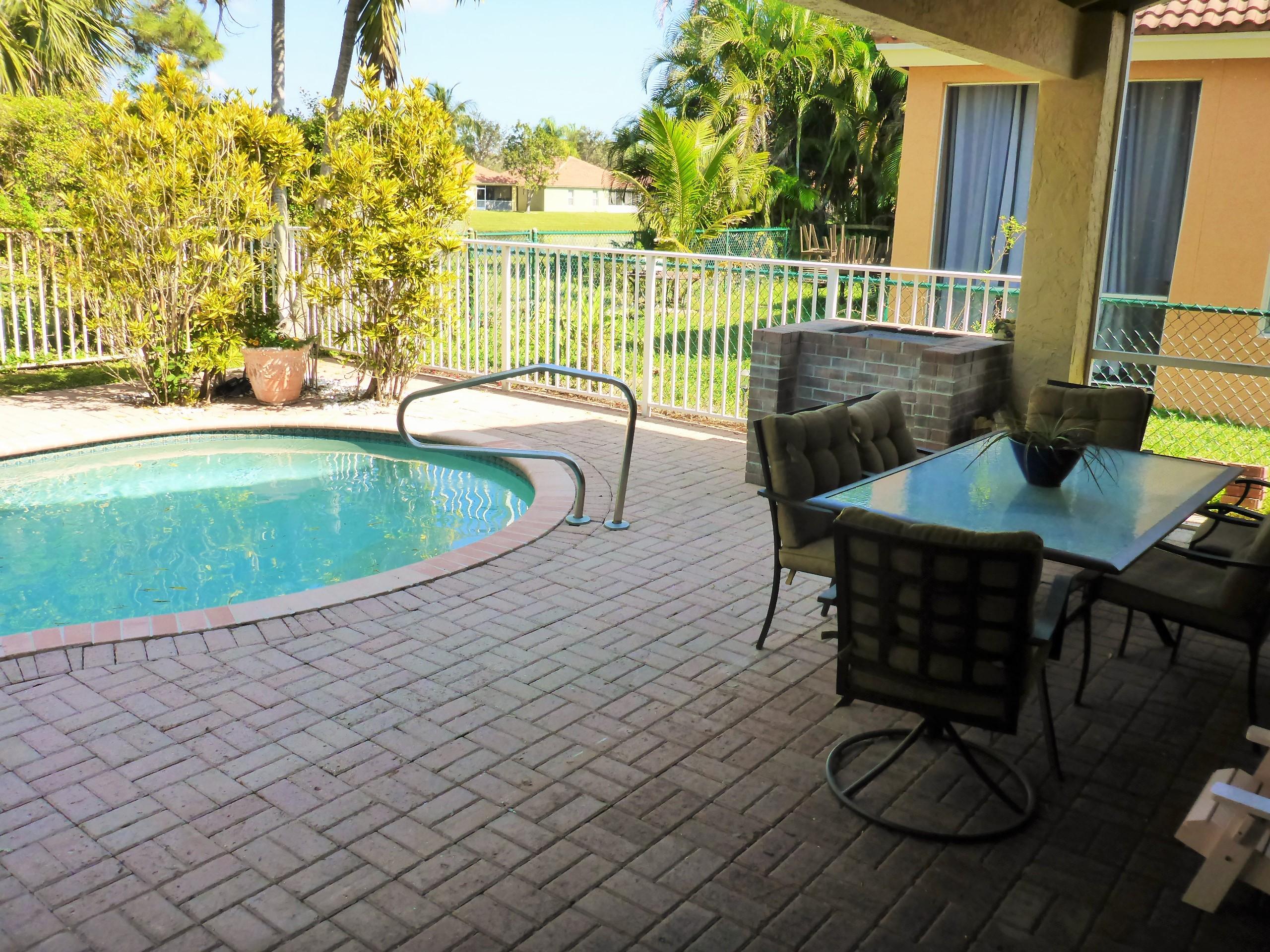 5124 Elpine Way Riviera Beach, FL 33418 - Photo 39 of 45 a view of balcony and patio