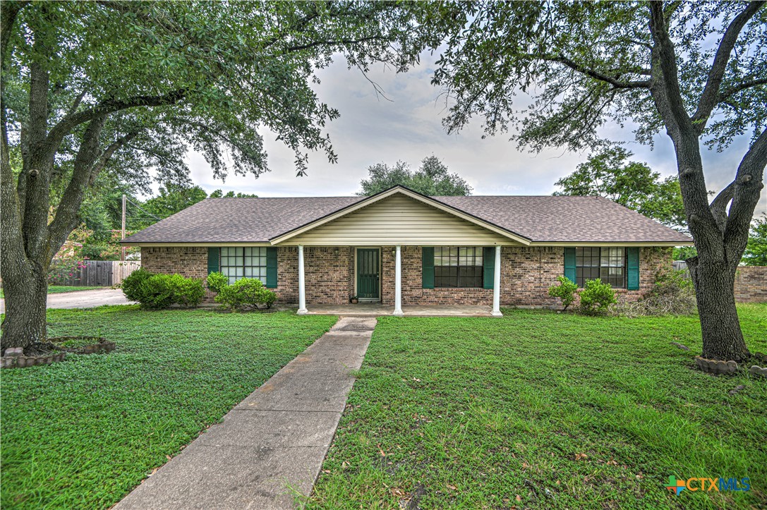 305 Tanglewood Road Temple, TX 76502 - Photo 1 of 46 a front view of a house with a yard