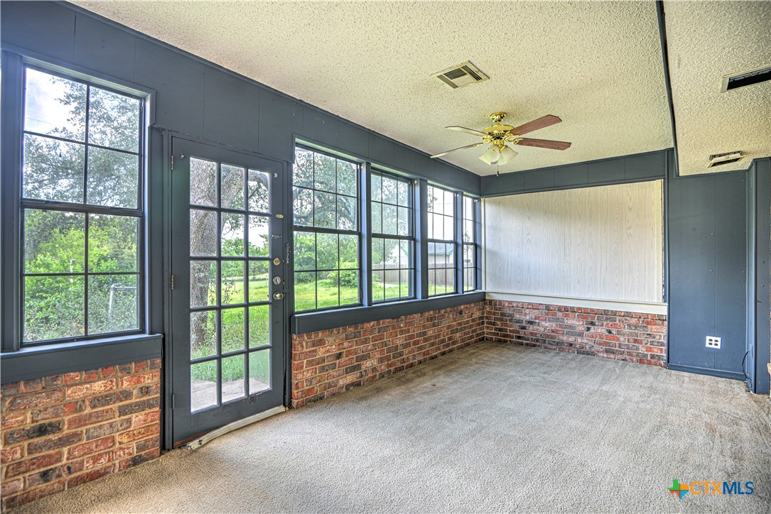 305 Tanglewood Road Temple, TX 76502 - Photo 14 of 46 a view of an empty room with a window