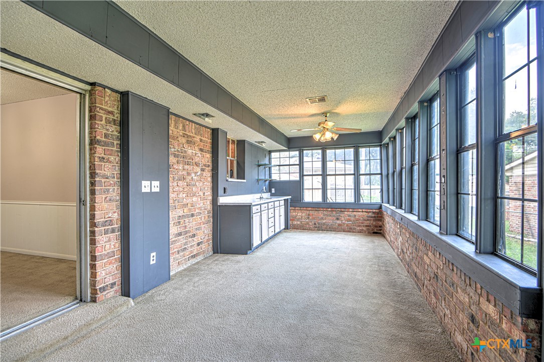 305 Tanglewood Road Temple, TX 76502 - Photo 15 of 46 a view of an empty room and a window