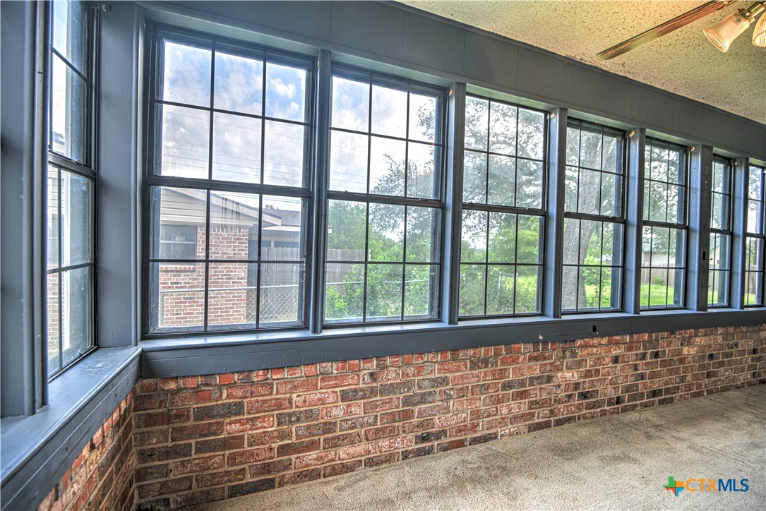 305 Tanglewood Road Temple, TX 76502 - Photo 17 of 46 a view of an empty room with a window