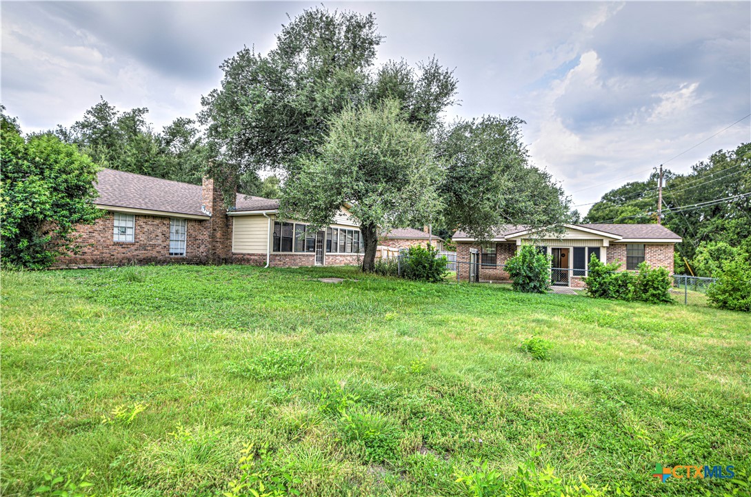 305 Tanglewood Road Temple, TX 76502 - Photo 30 of 46 a front view of a house with garden