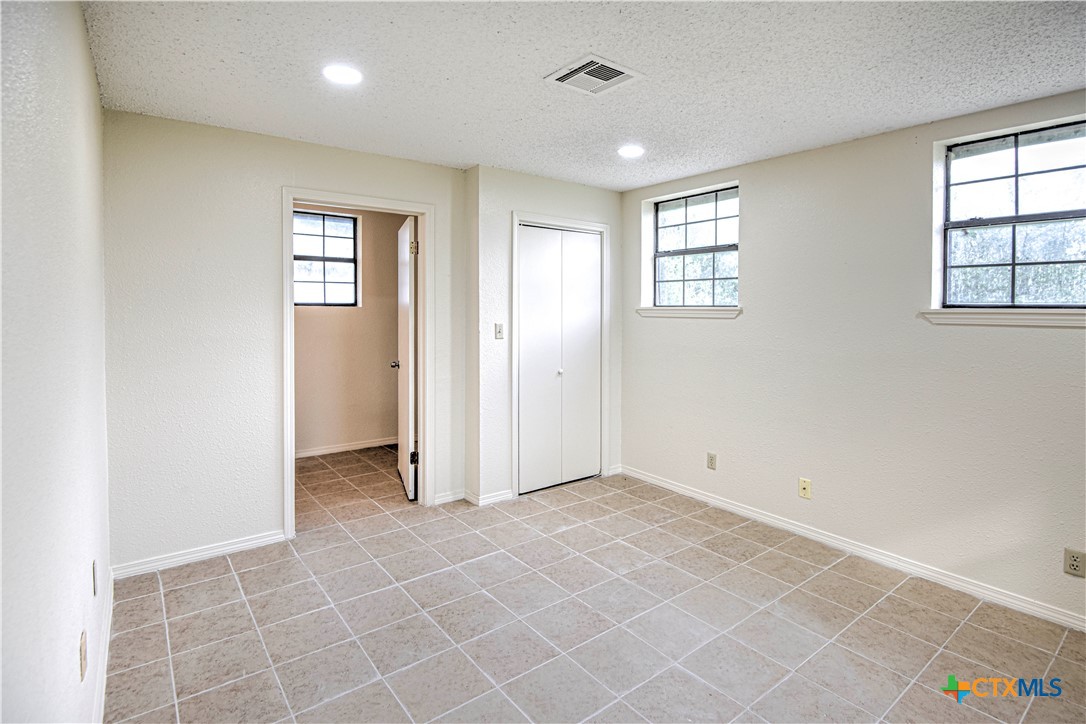 305 Tanglewood Road Temple, TX 76502 - Photo 42 of 46 an empty room with windows