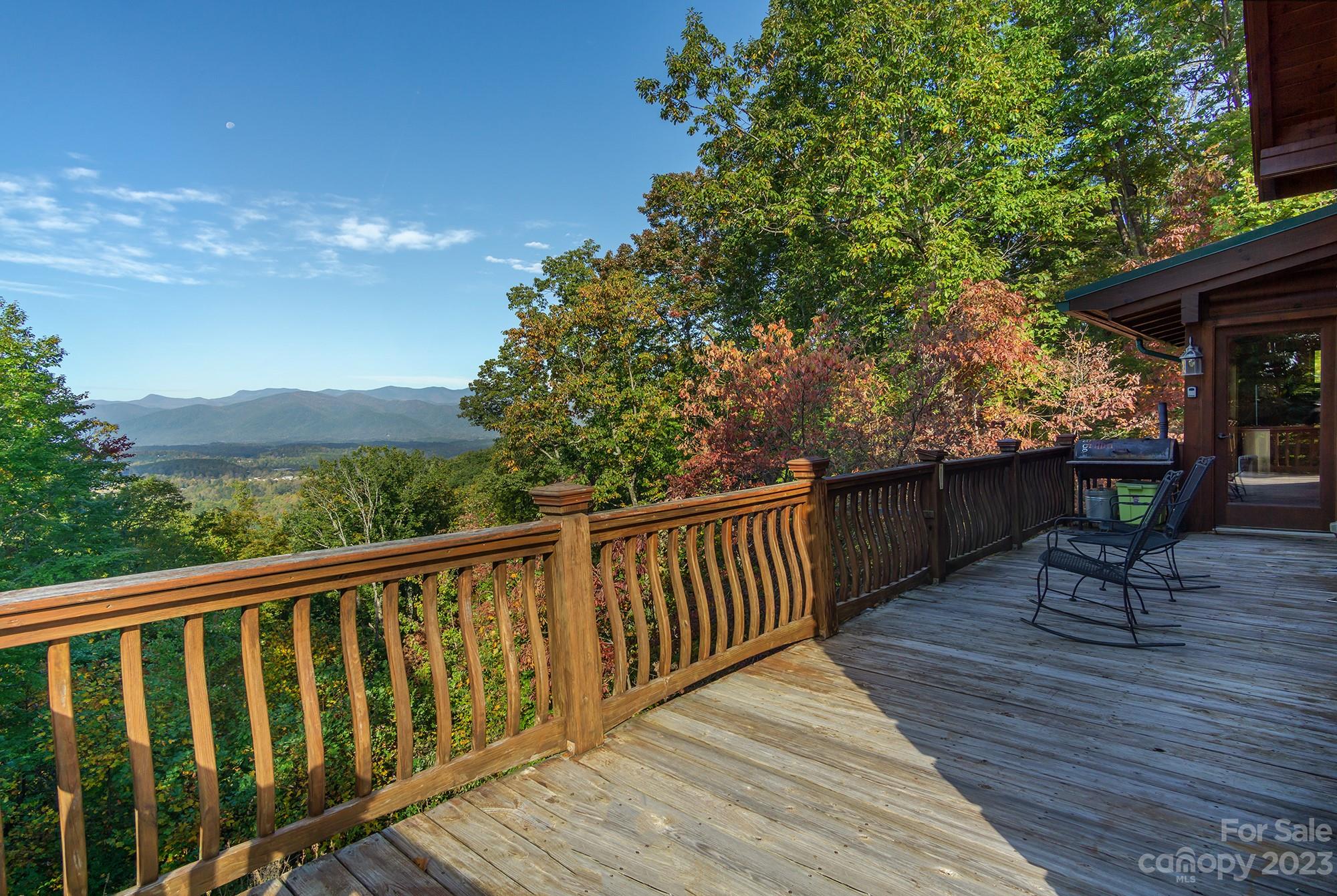 1595 Grants Mountain Road Marion, NC 28752 - Photo 4 of 31 a view of balcony with wooden floor and outdoor seating