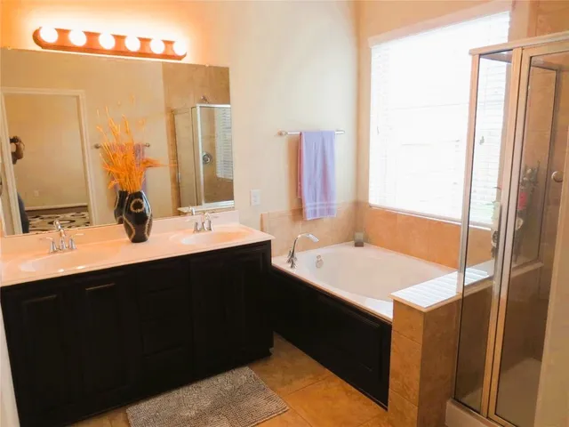 a bathroom with a sink and a tub