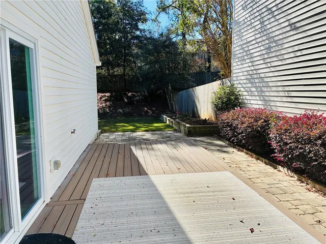 a view of swimming pool from a yard
