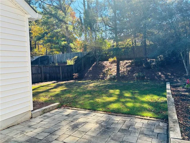 a view of house with swimming pool