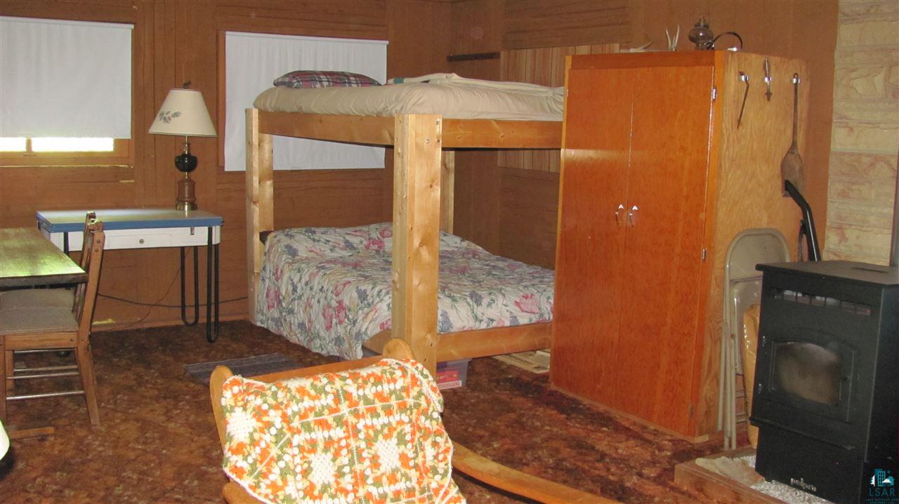 9288 West Branch Road Duluth, MN 55803 - Photo 17 of 21 WOOD PELLET FIREPLACE IN GUEST CABIN/ BUNK HOUSE