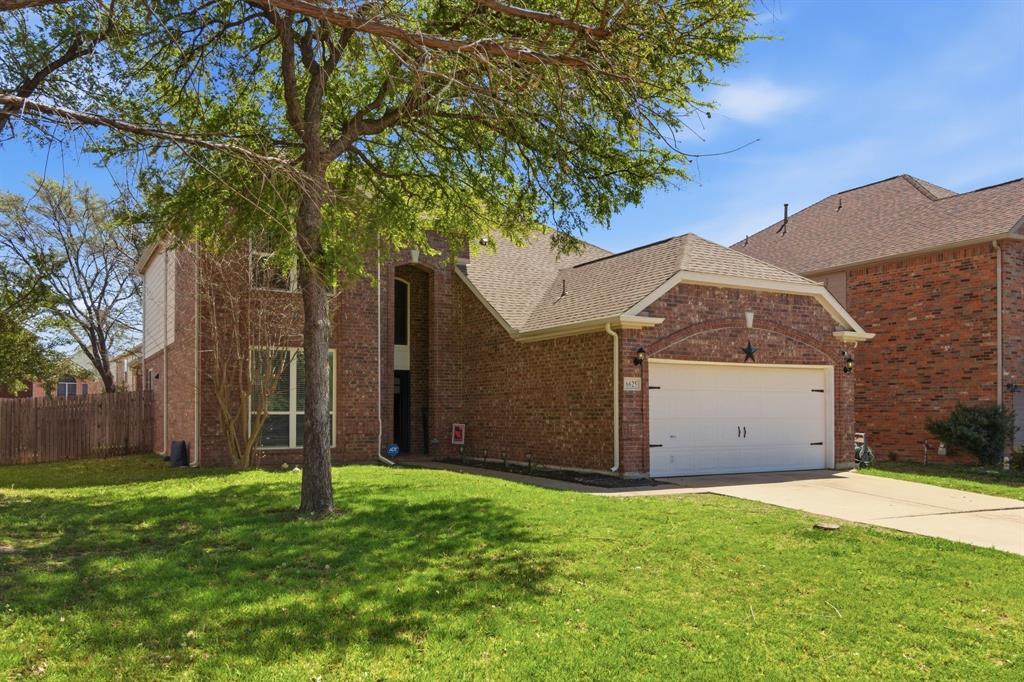 6625 Hayling Way Denton, TX 76210 - Photo 2 of 33 a view of a backyard with a plants and large trees