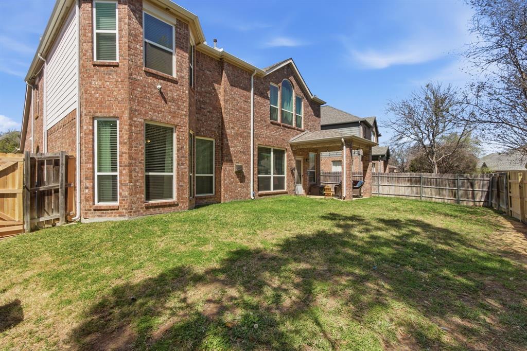 6625 Hayling Way Denton, TX 76210 - Photo 27 of 33 a front view of a house with a yard
