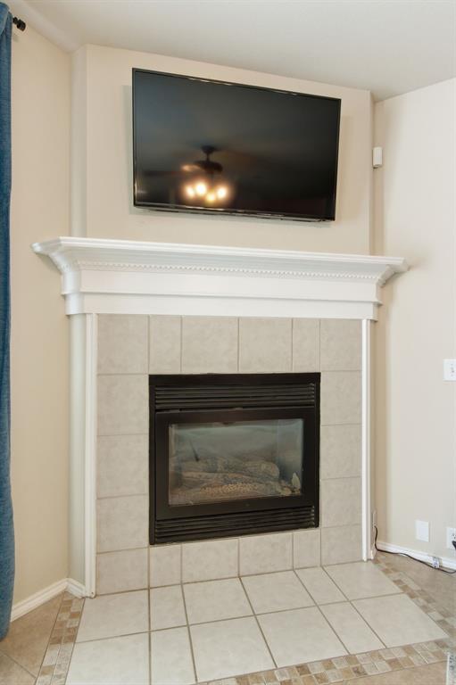 6625 Hayling Way Denton, TX 76210 - Photo 8 of 33 a fireplace with a fireplace in it