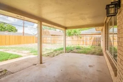 a view of a garden with an outdoor space