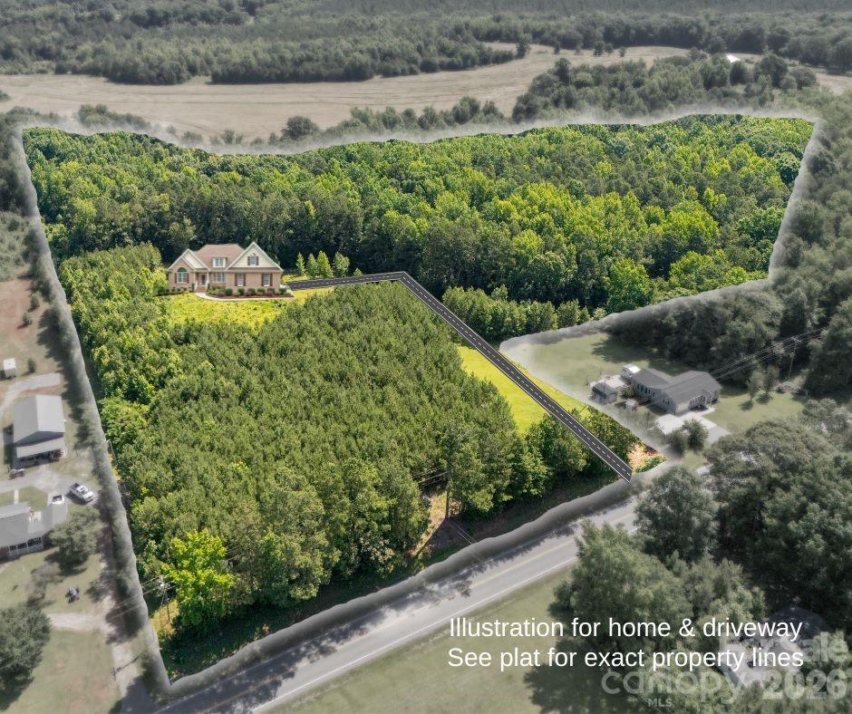 12.85-acres 12.85-acres Flat Creek Road Heath Springs, SC 29058 - Photo 2 of 7 a view of a garden with a bench