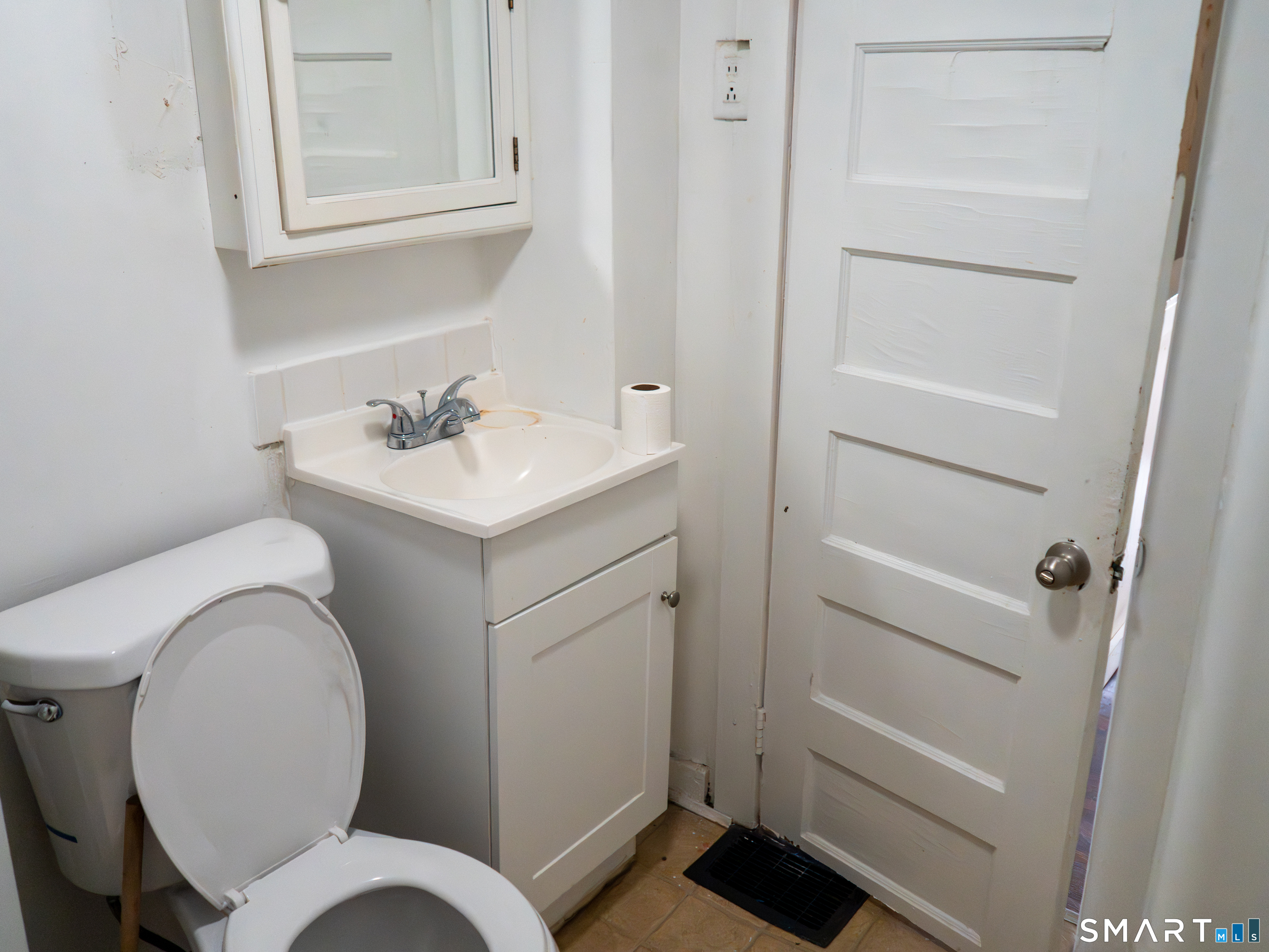 406 Poplar Street New Haven, CT 06513 - Photo 19 of 22 a bathroom with a toilet and a sink