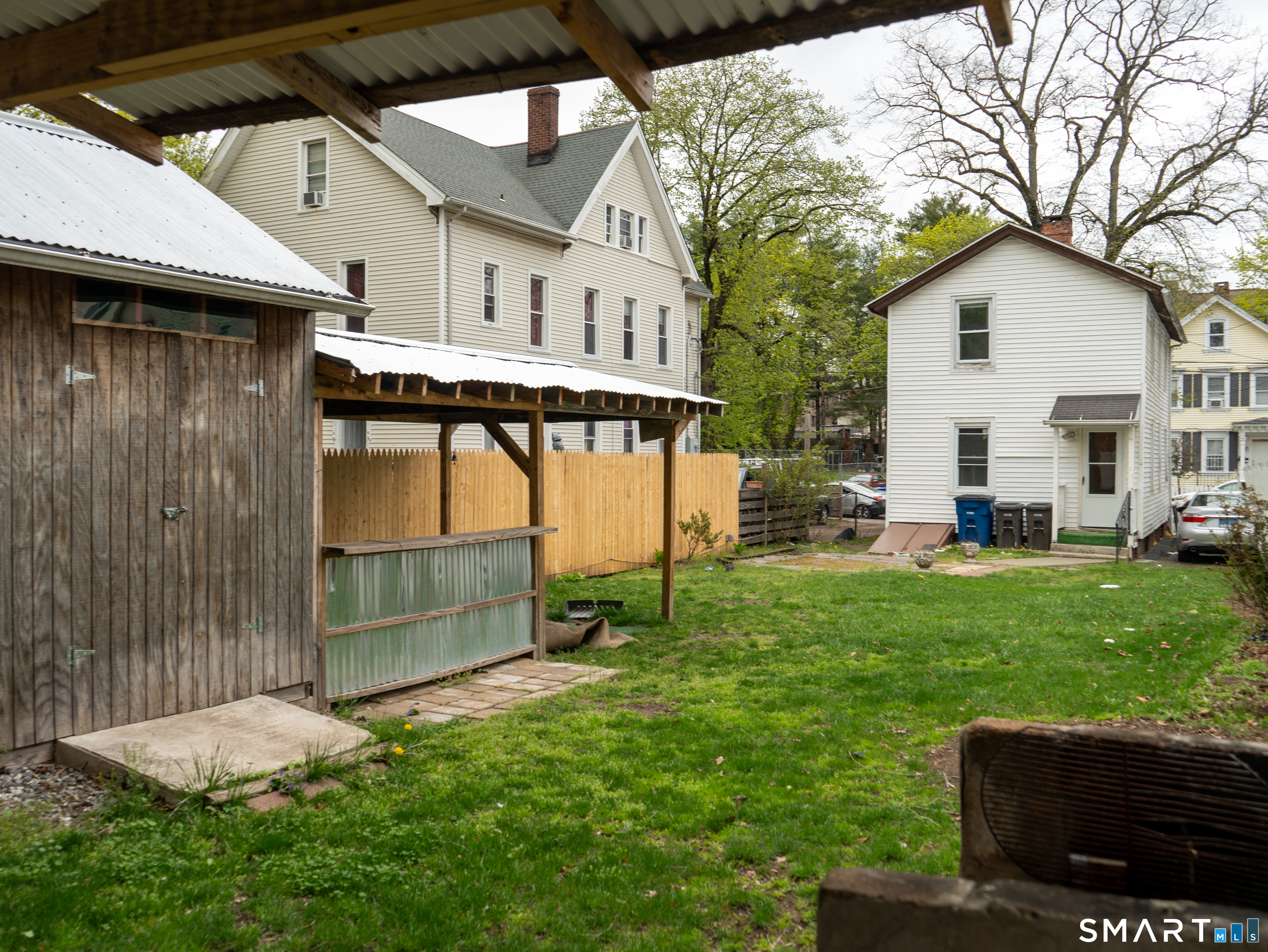 406 Poplar Street New Haven, CT 06513 - Photo 22 of 22 a backyard of a house with seating space
