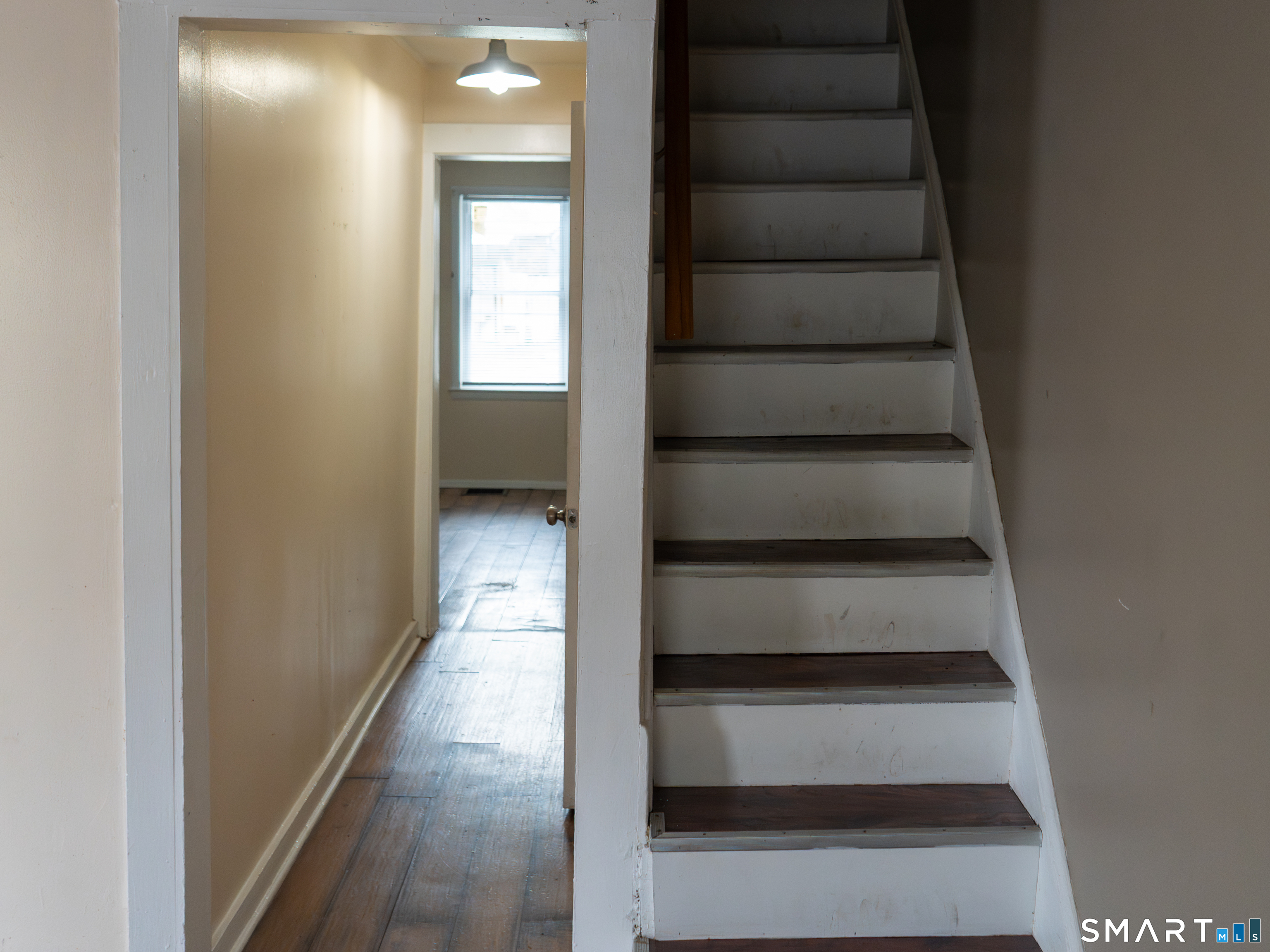 406 Poplar Street New Haven, CT 06513 - Photo 4 of 22 a view of staircase with white walls and white walls