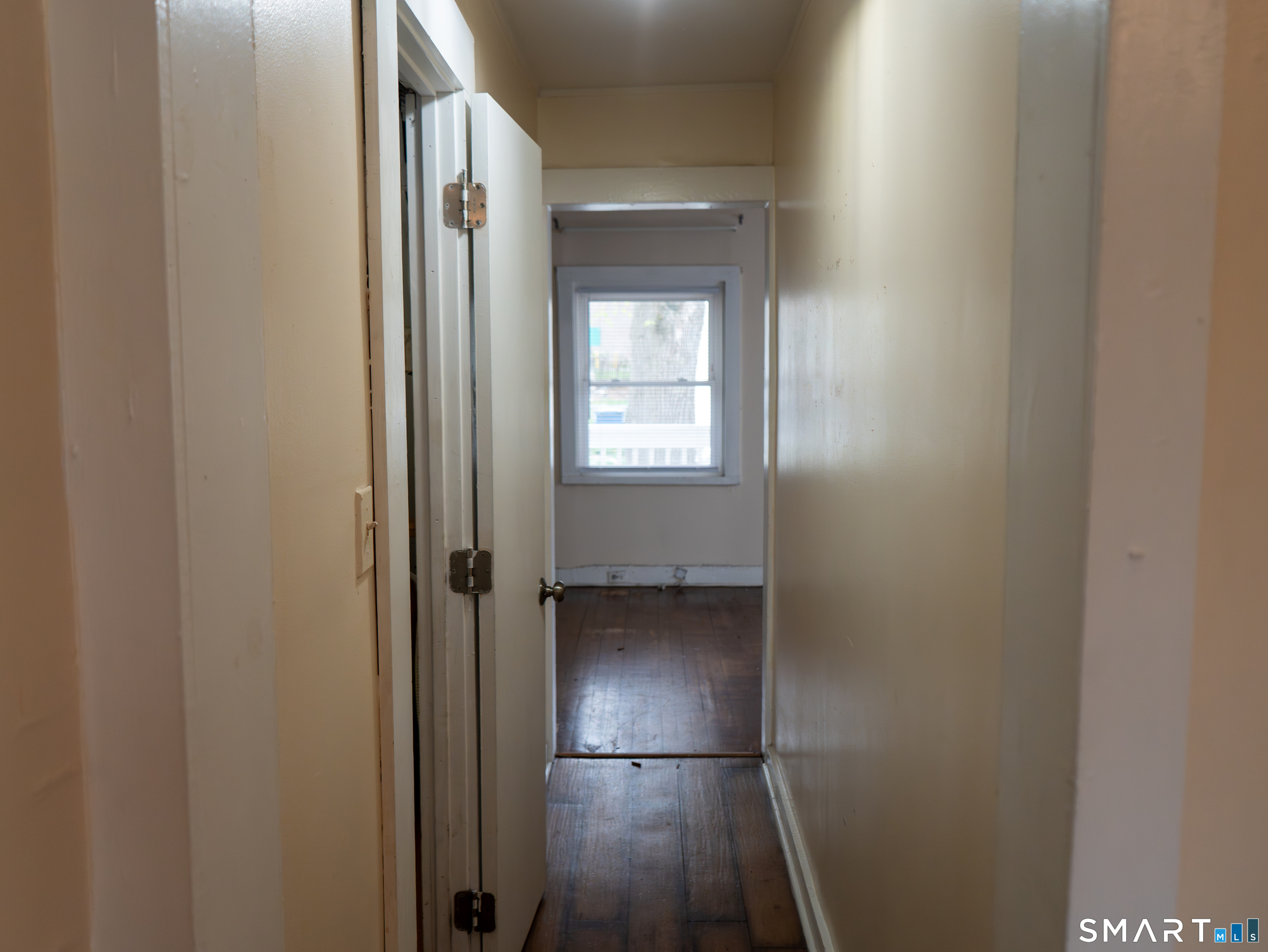 406 Poplar Street New Haven, CT 06513 - Photo 10 of 22 a view of a hallway with wooden floor