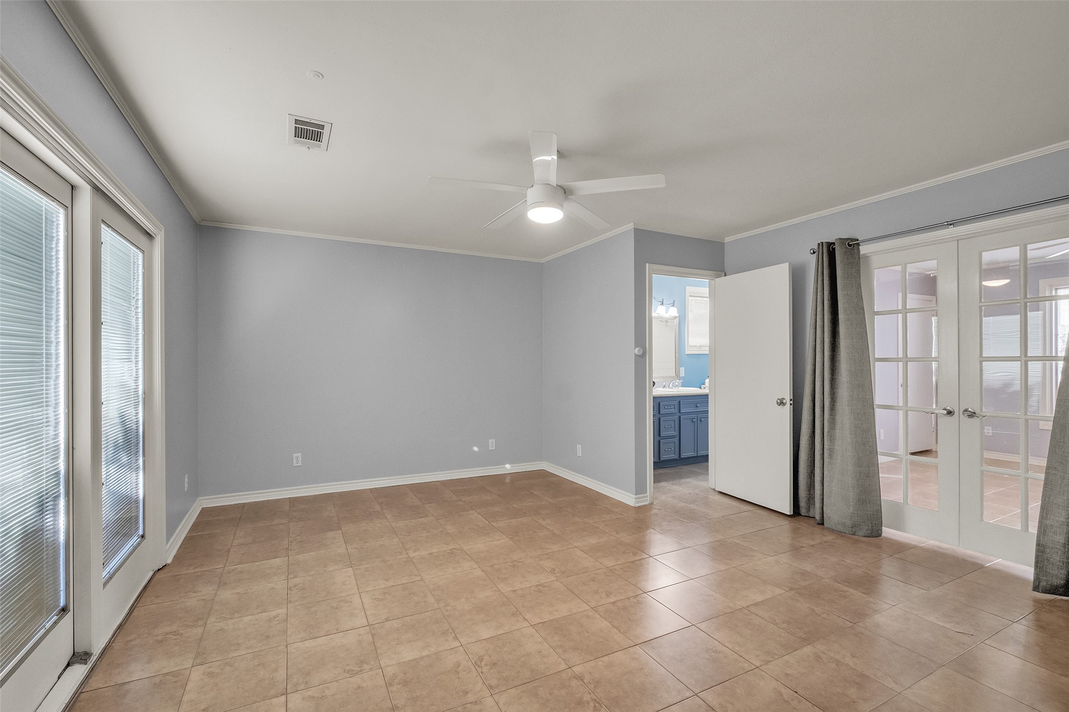 3932 Marquette Street Houston, TX 77005 - Photo 12 of 31 wooden floor in an empty room with a window