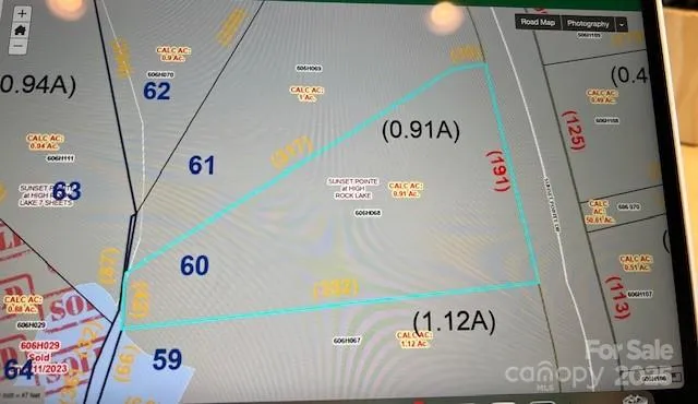 a white refrigerator with white walls