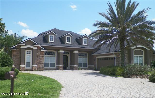 2000 River's Own Road St. Augustine, FL 32092 - Photo 1 of 36 a front view of a house with garden and porch