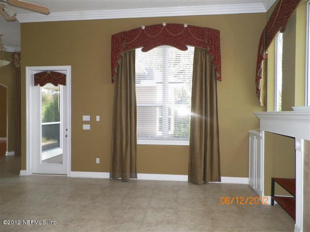 2000 River's Own Road St. Augustine, FL 32092 - Photo 17 of 36 a view of an empty room with a window