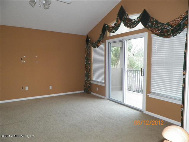 2000 River's Own Road St. Augustine, FL 32092 - Photo 19 of 36 a view of an empty room with a window