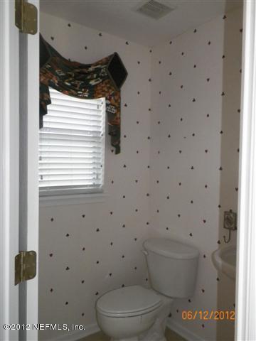 2000 River's Own Road St. Augustine, FL 32092 - Photo 21 of 36 a bathroom with a toilet and a shower