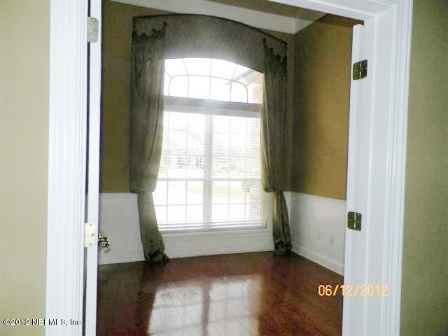 2000 River's Own Road St. Augustine, FL 32092 - Photo 23 of 36 a view of an empty room with a window