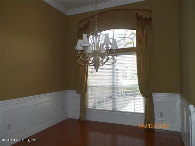 2000 River's Own Road St. Augustine, FL 32092 - Photo 5 of 36 a view of empty room with wooden floor and fan