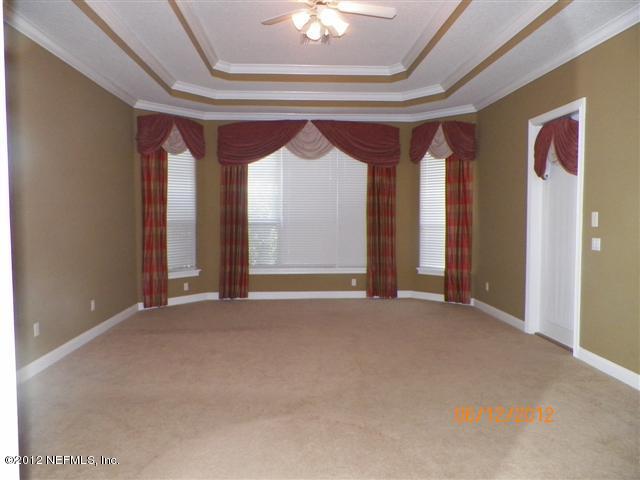 2000 River's Own Road St. Augustine, FL 32092 - Photo 6 of 36 a view of an empty room with a window