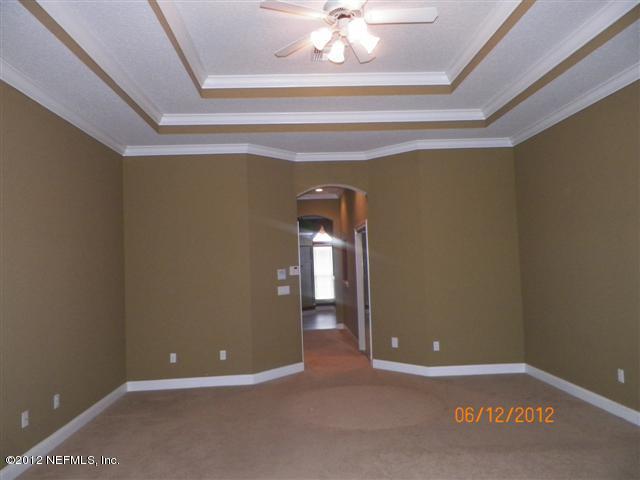 2000 River's Own Road St. Augustine, FL 32092 - Photo 7 of 36 a view of a hallway with wooden floor