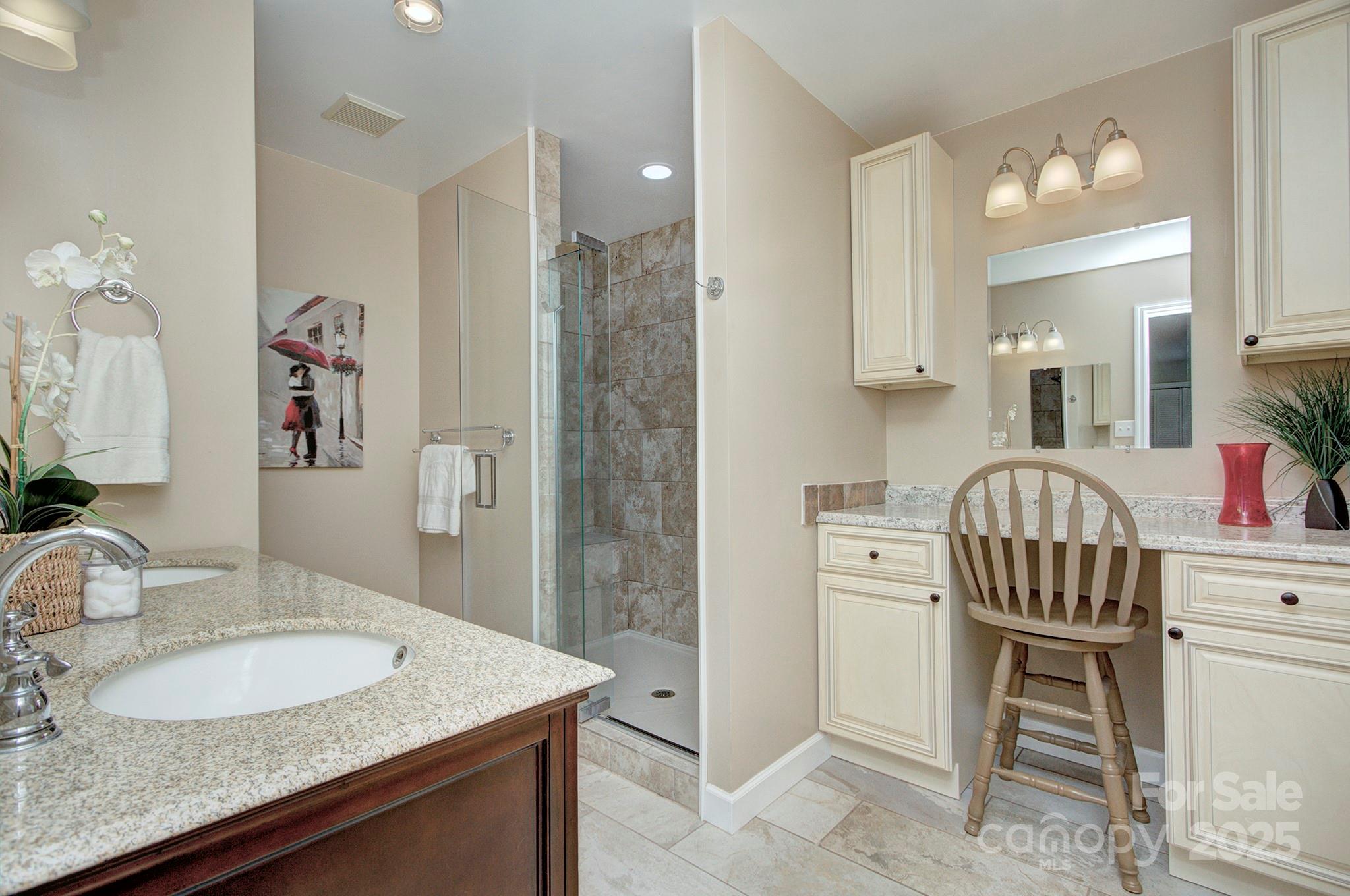 1615 Deer Run Road Catawba, SC 29704 - Photo 17 of 31 a en suite bathroom with a granite countertop sink a mirror and a shower